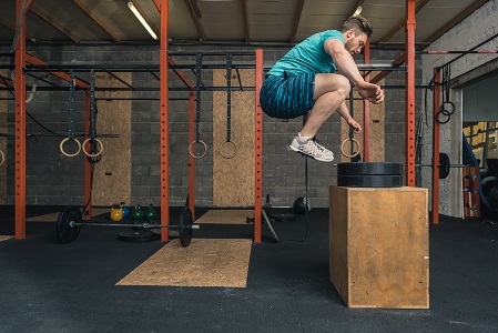 Male Crossfit Trainer Jumping